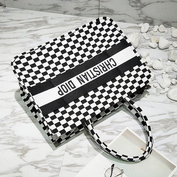 Black and white checkered shoulder bag